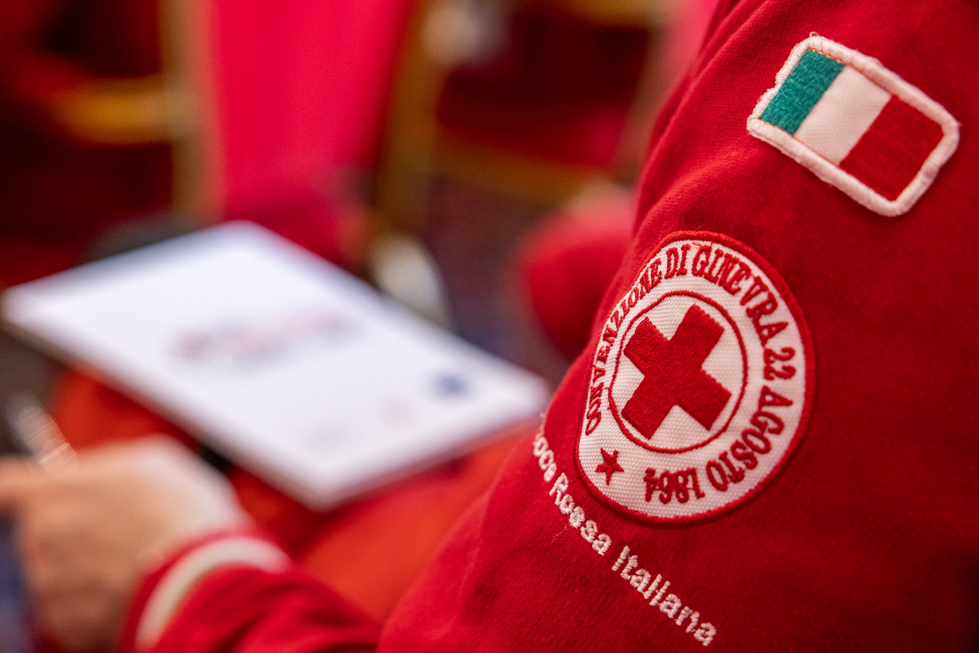 close up of a red cross worker's arm